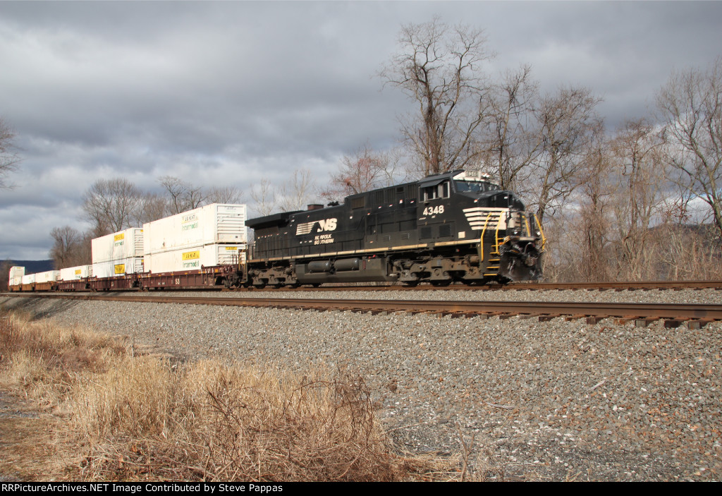 NS 4348 is solo on the head of a stack train